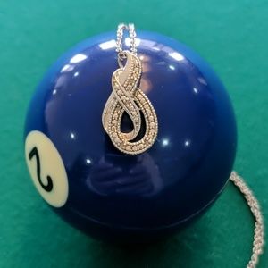 Small diamond necklace.